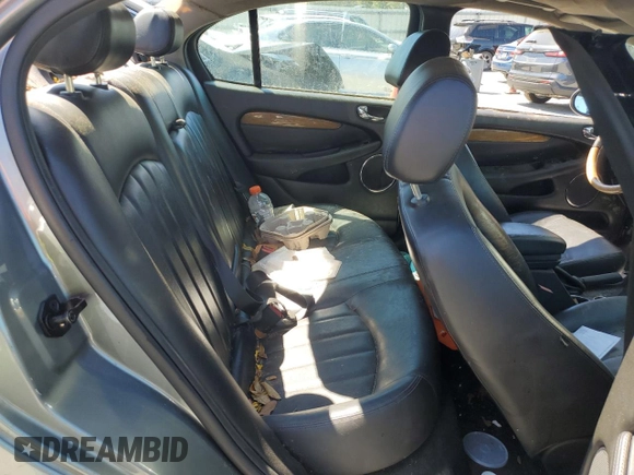 2004 Jaguar X-Type with VIN SAJEA51C04WD91344, listed as a Copart auction lot 49979285 with Not Provided miles and Salvage Title. Bid and sale history available at DreamBid. Image 10.