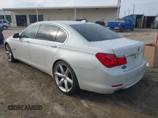 2011 BMW 7 Series 750Li with VIN WBAKB8C54BC852374, listed as a IAAI auction lot 41484350 with 137,388 mi miles. Bid and sale history available at carsss.com. Image 3.