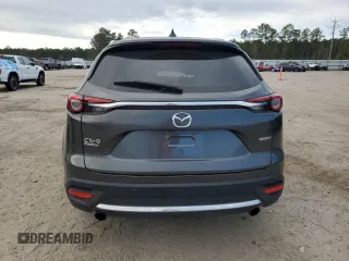 2023 Mazda CX-9 Signature с VIN JM3TCBEY2P0642851, выставлен на аукционе Copart как лот 42877495 с пробегом 43 141 миль миль и Списание • Salvage title. История ставок и продаж доступна на DreamBid. Изображение 6.
