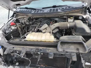 2021 Ford F-150 XL с VIN 1FTEW1C53MFB80059, выставлен на аукционе Copart как лот 58835805 с пробегом 85 998 миль миль и Списание • Salvage title. История ставок и продаж доступна на DreamBid. Изображение 16.