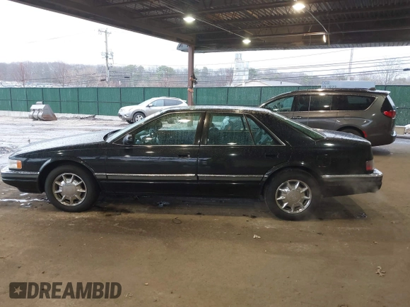 1997 Cadillac Seville Luxury SLS with VIN 1G6KS52YXVU816736, listed as a IAAI auction lot 41854220 with 107,091 mi miles. Bid and sale history available at carsss.com. Image 14.