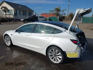 2019 Tesla Model 3 Long Range with VIN 5YJ3E1EB7KF442390, listed as a IAAI auction lot 41700122 with 65,539 mi miles. Bid and sale history available at carsss.com. Image 3.