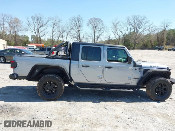 2021 Jeep Gladiator Freedom with VIN 1C6HJTAG3ML540967, listed as a IAAI auction lot 41883858 with 92,287 mi miles and . Bid and sale history available at DreamBid. Image 13.