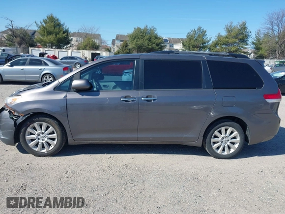 2012 Toyota Sienna XLE with VIN 5TDDK3DC5CS047530, listed as a IAAI auction lot 41780049 with 209,812 mi miles. Bid and sale history available at carsss.com. Image 15.