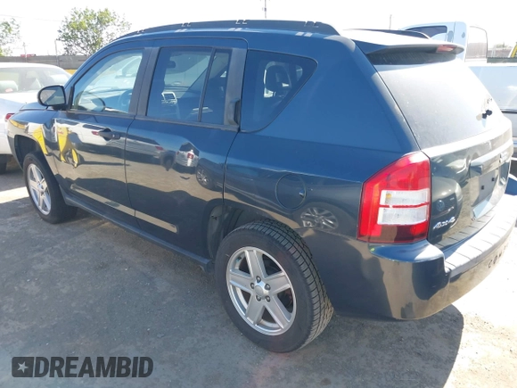 2007 Jeep Compass Sport with VIN 1J8FF47W27D110618, listed as a IAAI auction lot 42195311 with 135,128 mi miles and . Bid and sale history available at carsss.com. Image 3.