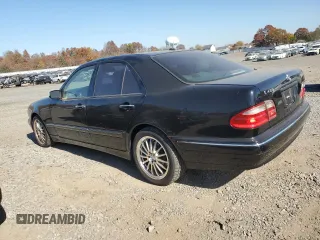 2002 Mercedes-Benz E-Class with VIN WDBJF70J82B492531, listed as a Copart auction lot 77485094 with 85,750 mi miles and Salvage Title. Bid and sale history available at carsss.com. Image 2.