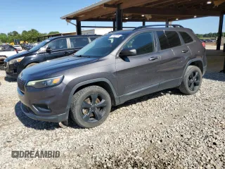 2020 Jeep Cherokee Altitude with VIN 1C4PJLLB1LD573710, listed as a Copart auction lot 57703275 with 124,016 mi miles and Salvage title. Bid and sale history available at DreamBid. Image 1.