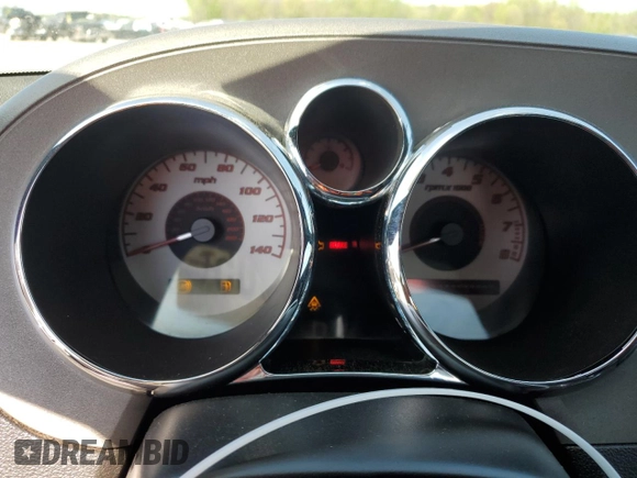 2008 Pontiac Solstice z VIN 1G2MC35B58Y123587, wystawiony jako Copart lot #52017005 z przebiegiem Nie podano mil oraz Szkoda całkowita • Salvage title. Historia ofert i sprzedaży dostępna na DreamBid. Obrazek 9.