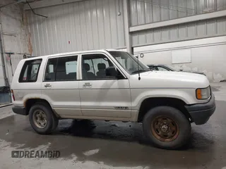 1994 Isuzu Trooper с VIN JACDH58V9R7919182, выставлен на аукционе IAAI как лот 42333093 с пробегом 192 819 миль миль и . История ставок и продаж доступна на DreamBid. Изображение 13.