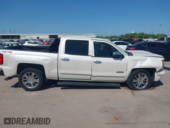 2014 Chevrolet Silverado 1500 High Country with VIN 3GCUKTEC4EG409072, listed as a IAAI auction lot 41986843 with 124,058 mi miles. Bid and sale history available at carsss.com. Image 14.
