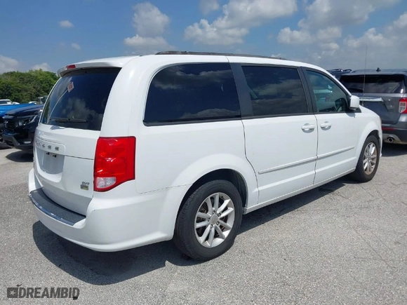 2014 Dodge Grand Caravan SXT with VIN 2C4RDGCGXER465279, listed as a IAAI auction lot 41917585 with 60,747 mi miles. Bid and sale history available at carsss.com. Image 4.