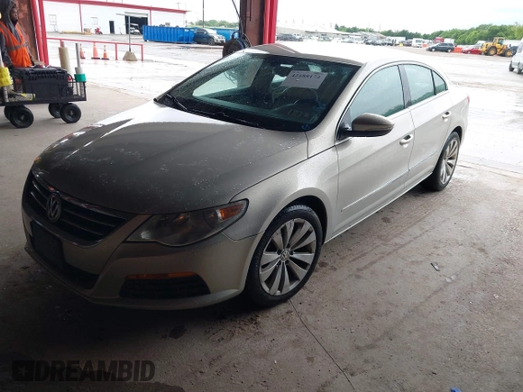 2011 Volkswagen CC Sport with VIN WVWMP7AN3BE733004, listed as a IAAI auction lot 42188172 with 169,293 mi miles. Bid and sale history available at carsss.com. Image 2.