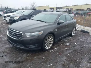2013 Ford Taurus Limited with VIN 1FAHP2F82DG192581, listed as a IAAI auction lot 41490122 with 196,515 mi miles. Bid and sale history available at carsss.com. Image 2.