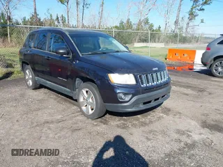 2011 Jeep Compass with VIN 1J4NT1FA4BD208116, listed as a IAAI auction lot 41604552 with 179,633 mi miles. Bid and sale history available at carsss.com. Image 1.