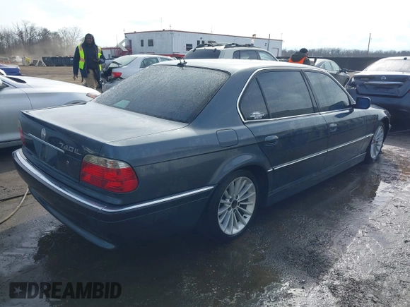 2001 BMW 7 Series 740iL with VIN WBAGH83491DP28749, listed as a IAAI auction lot 41440556 with 198,734 mi miles. Bid and sale history available at carsss.com. Image 4.