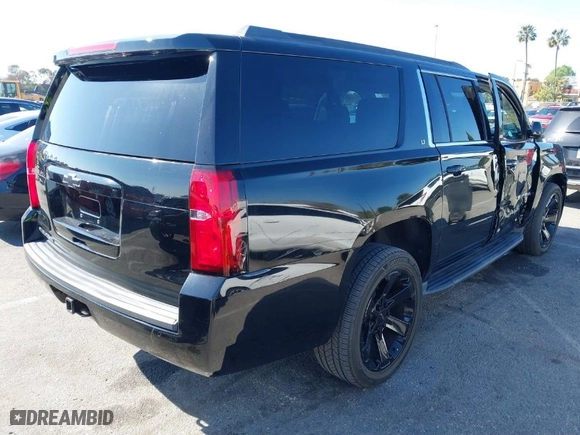 2020 Chevrolet Suburban LT with VIN 1GNSCHKC2LR229759, listed as a IAAI auction lot 41649465 with NaN miles. Bid and sale history available at carsss.com. Image 4.