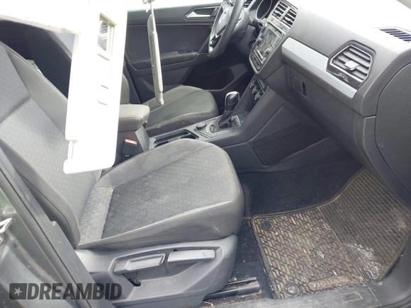 2018 Volkswagen Tiguan S with VIN 3VV0B7AX2JM011628, listed as a IAAI auction lot 41685841 with 129,484 mi miles and . Bid and sale history available at DreamBid. Image 5.