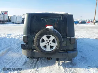 2010 Jeep Wrangler Unlimited Sport with VIN 1J4BA3H12AL127802, listed as a IAAI auction lot 41237029 with 94,320 mi miles. Bid and sale history available at carsss.com. Image 17.