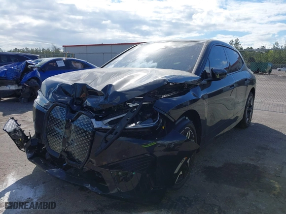 2025 BMW iX xDrive50 with VIN WB523CF04SCT06575, listed as a IAAI auction lot 41525744 with 732 mi miles. Bid and sale history available at carsss.com. Image 6.