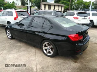 2015 BMW 3 Series 328i xDrive with VIN WBA3B3G50FNR88402, listed as a IAAI auction lot 42368174 with 214,471 mi miles and . Bid and sale history available at DreamBid. Image 3.
