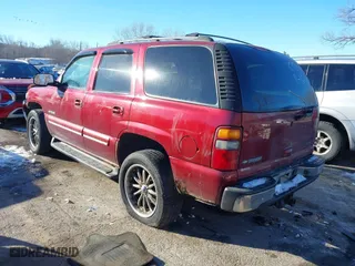 2002 Chevrolet Tahoe LT with VIN 1GNEK13Z82J299497, listed as a IAAI auction lot 41304388 with 146,007 mi miles. Bid and sale history available at carsss.com. Image 3.