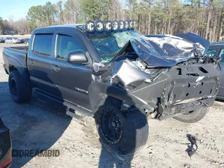 2014 Toyota Tacoma PreRunner with VIN 5TFJX4GN8EX036381, listed as a IAAI auction lot 41716997 with 165,523 mi miles and . Bid and sale history available at DreamBid. Image 1.
