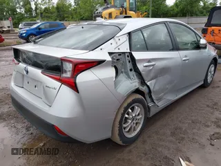2019 Toyota Prius L Eco z VIN JTDKARFU2K3096560, wystawiony jako IAAI lot #42322950 z przebiegiem 20 866 mil mil oraz . Historia ofert i sprzedaży dostępna na DreamBid. Obrazek 4.