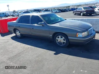 1998 Cadillac DeVille DHS z VIN 1G6KE54Y7WU783104, wystawiony jako IAAI lot #41664318 z przebiegiem Nie podano mil oraz . Historia ofert i sprzedaży dostępna na DreamBid. Obrazek 1.