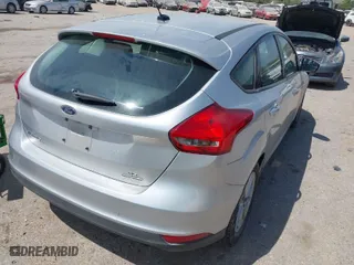 2016 Ford Focus SE with VIN 1FADP3K29GL269691, listed as a IAAI auction lot 42061051 with 100,692 mi miles. Bid and sale history available at carsss.com. Image 4.