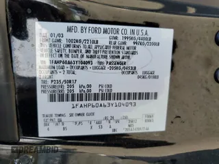 2003 Ford Thunderbird Deluxe z VIN 1FAHP60A63Y104093, wystawiony jako Copart lot #76028744 z przebiegiem 79 995 mil mil oraz Szkoda całkowita • Salvage title. Historia ofert i sprzedaży dostępna na DreamBid. Obrazek 12.