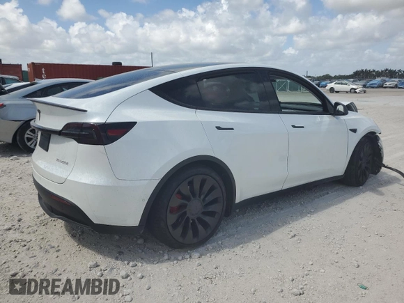 2022 Tesla Model Y Performance with VIN 7SAYGDEFXNF410531, listed as a Copart auction lot 54449715 with Not Provided miles and Non Repairable. Bid and sale history available at DreamBid. Image 3.