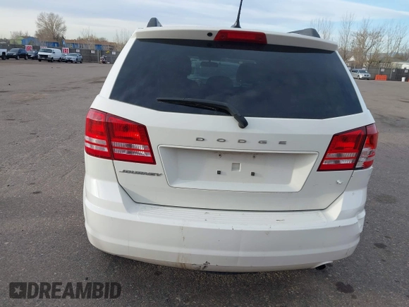 2017 Dodge Journey SE with VIN 3C4PDCAB6HT670624, listed as a IAAI auction lot 41777947 with 143,496 mi miles and . Bid and sale history available at DreamBid. Image 16.