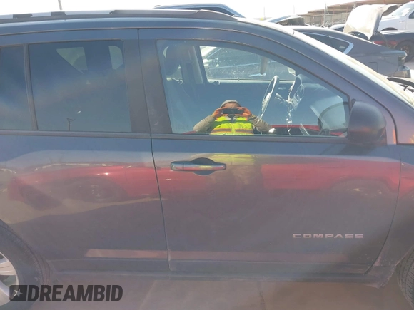 2015 Jeep Compass Sport with VIN 1C4NJCBBXFD274472, listed as a IAAI auction lot 41629585 with 124,407 mi miles. Bid and sale history available at carsss.com. Image 14.
