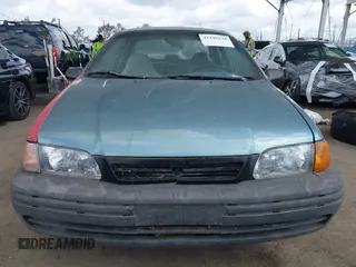 1993 Toyota Tercel Std z VIN JT2EL46S9P0364501, wystawiony jako IAAI lot #42249238 z przebiegiem 211 679 mil mil oraz . Historia ofert i sprzedaży dostępna na DreamBid. Obrazek 6.