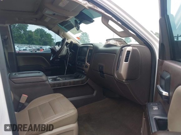 2015 GMC Sierra 2500HD Denali z VIN 1GT120E89FF190917, wystawiony jako IAAI lot #42271537 z przebiegiem 149 307 mil mil oraz . Historia ofert i sprzedaży dostępna na DreamBid. Obrazek 5.