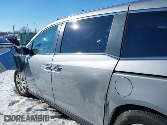 2017 Honda Odyssey EX-L with VIN 5FNRL5H6XHB003389, listed as a IAAI auction lot 41329731 with 203,368 mi miles and . Bid and sale history available at DreamBid. Image 13.
