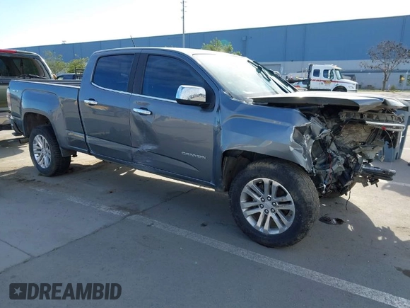 2018 GMC Canyon 4WD SLT with VIN 1GTP6DE11J1302382, listed as a IAAI auction lot 41318784 with 114,981 mi miles. Bid and sale history available at carsss.com. Image 1.