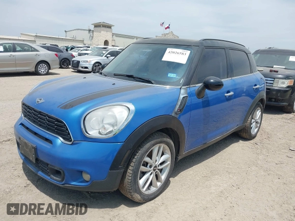 2014 MINI Countryman S with VIN WMWZC3C52EWP28069, listed as a IAAI auction lot 42026583 with 137,342 mi miles and . Bid and sale history available at DreamBid. Image 2.