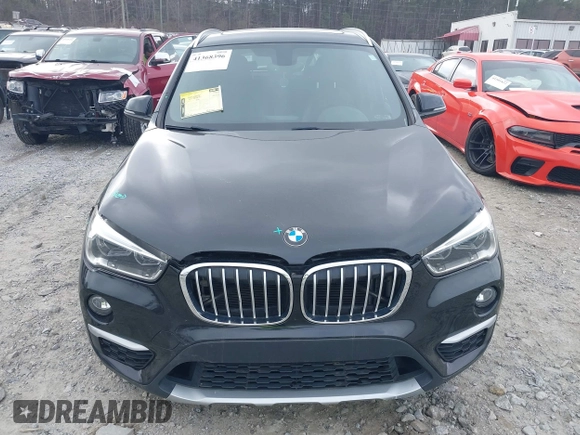 2017 BMW X1 sDrive28i with VIN WBXHU7C36HP924874, listed as a IAAI auction lot 41368396 with 113,443 mi miles. Bid and sale history available at carsss.com. Image 11.
