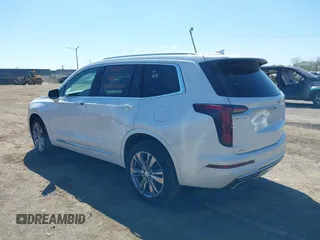 2023 Cadillac XT6 AWD Premium Luxury z VIN 1GYKPDRS4PZ182799, wystawiony jako IAAI lot #42161097 z przebiegiem 22 776 mil mil oraz . Historia ofert i sprzedaży dostępna na DreamBid. Obrazek 3.