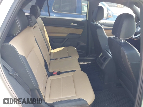 2022 Volkswagen Atlas SE z VIN 1V2HE2CA5NC225233, wystawiony jako IAAI lot #42366811 z przebiegiem 27 986 mil mil oraz . Historia ofert i sprzedaży dostępna na DreamBid. Obrazek 8.