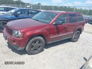 2007 Jeep Grand Cherokee Laredo with VIN 1J8GR48K57C618529, listed as a IAAI auction lot 42139566 with 174,559 mi miles. Bid and sale history available at carsss.com. Image 2.