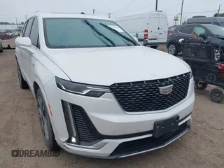 2020 Cadillac XT6 FWD Premium Luxury z VIN 1GYKPCRS2LZ101061, wystawiony jako IAAI lot #42113360 z przebiegiem Nie podano mil oraz . Historia ofert i sprzedaży dostępna na DreamBid. Obrazek 1.