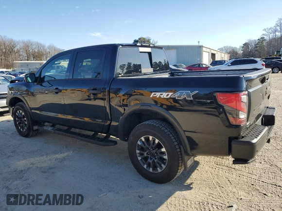 2024 Nissan Titan Pro-4X with VIN 1N6AA1ED6RN111104, listed as a Copart auction lot 46129425 with 4,903 mi miles and Salvage title. Bid and sale history available at DreamBid. Image 2.