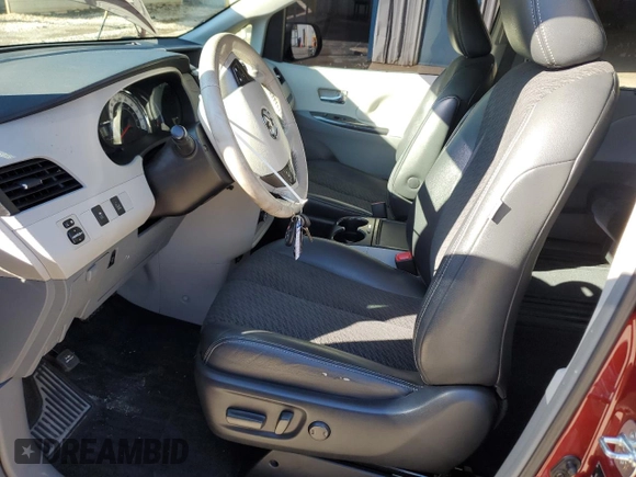 2014 Toyota Sienna SE with VIN 5TDXK3DC2ES518694, listed as a Copart auction lot 45270805 with 170,824 mi miles and Salvage Title. Bid and sale history available at DreamBid. Image 7.
