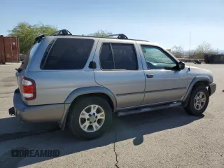 2001 Nissan Pathfinder SE с VIN JN8DR07Y71W520959, выставлен на аукционе Copart как лот 72599614 с пробегом 186 415 миль миль и Списание • Salvage title. История ставок и продаж доступна на DreamBid. Изображение 3.