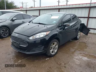 2016 Ford Fiesta SE z VIN 3FADP4BJ0GM144445, wystawiony jako IAAI lot #41532574 z przebiegiem 110 324 mil mil oraz . Historia ofert i sprzedaży dostępna na DreamBid. Obrazek 2.