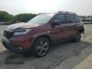 2019 Honda Passport Touring with VIN 5FNYF8H9XKB026631, listed as a Copart auction lot 61037545 with 54,041 mi miles and Salvage title. Bid and sale history available at DreamBid. Image 1.