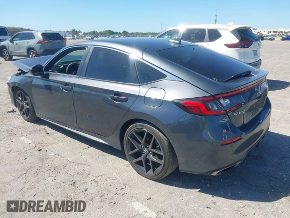 2023 Honda Civic Sport Touring z VIN 19XFL1H80PE017819, wystawiony jako IAAI lot #41833813 z przebiegiem 26 279 mil mil oraz . Historia ofert i sprzedaży dostępna na DreamBid. Obrazek 3.