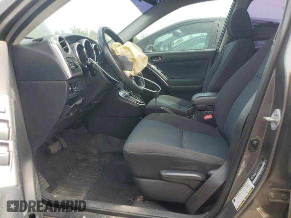 2007 Toyota Matrix STD z VIN 2T1KR32E97C638160, wystawiony jako Copart lot #54834185 z przebiegiem 280 957 mil mil oraz Szkoda całkowita • Salvage title. Historia ofert i sprzedaży dostępna na DreamBid. Obrazek 7.